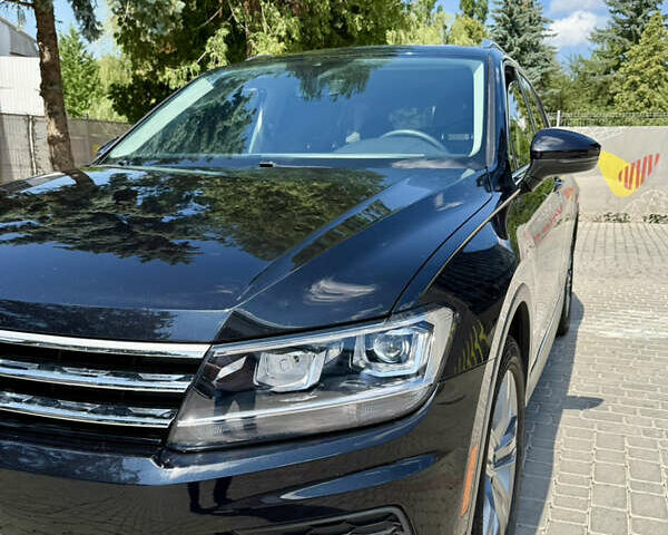 Черный Фольксваген Тигуан, объемом двигателя 1.98 л и пробегом 128 тыс. км за 23000 $, фото 3 на Automoto.ua