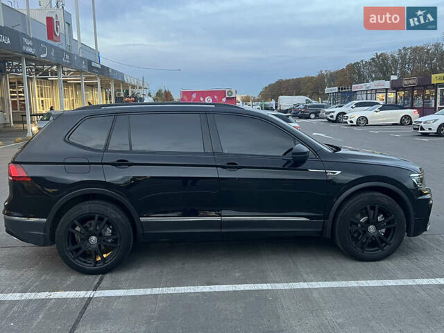 Чорний Фольксваген Тігуан, об'ємом двигуна 2 л та пробігом 56 тис. км за 23700 $, фото 7 на Automoto.ua