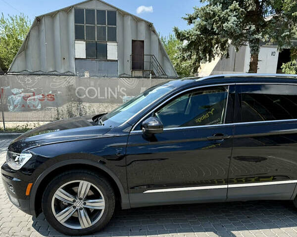 Черный Фольксваген Тигуан, объемом двигателя 1.98 л и пробегом 128 тыс. км за 23000 $, фото 5 на Automoto.ua