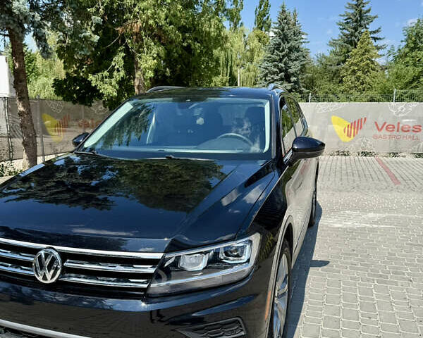 Черный Фольксваген Тигуан, объемом двигателя 1.98 л и пробегом 128 тыс. км за 23000 $, фото 2 на Automoto.ua