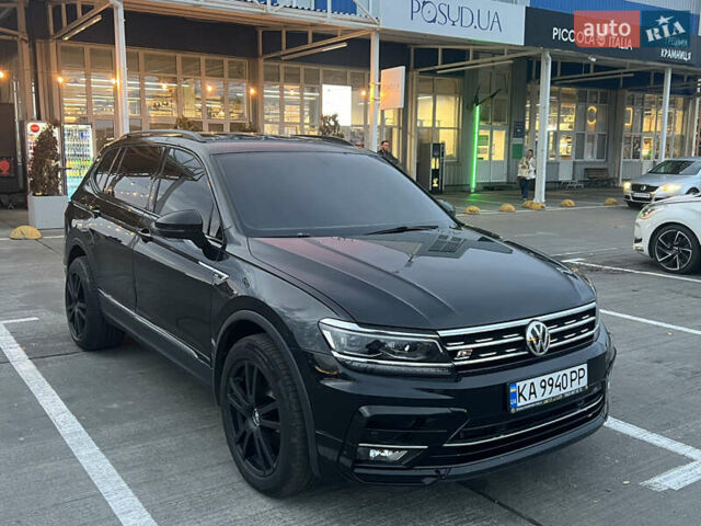 Чорний Фольксваген Тігуан, об'ємом двигуна 2 л та пробігом 56 тис. км за 23700 $, фото 2 на Automoto.ua