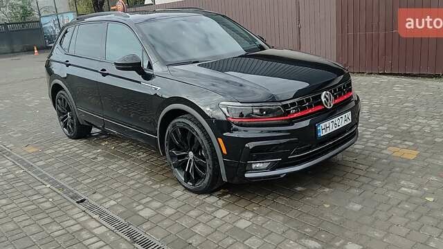 Чорний Фольксваген Тігуан, об'ємом двигуна 2 л та пробігом 123 тис. км за 22500 $, фото 1 на Automoto.ua
