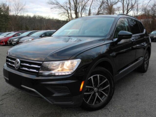 Черный Фольксваген Тигуан, объемом двигателя 2 л и пробегом 15 тыс. км за 17000 $, фото 2 на Automoto.ua