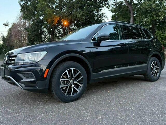 Черный Фольксваген Тигуан, объемом двигателя 2 л и пробегом 19 тыс. км за 5800 $, фото 2 на Automoto.ua