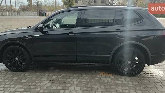 Чорний Фольксваген Тігуан, об'ємом двигуна 2 л та пробігом 123 тис. км за 22500 $, фото 6 на Automoto.ua