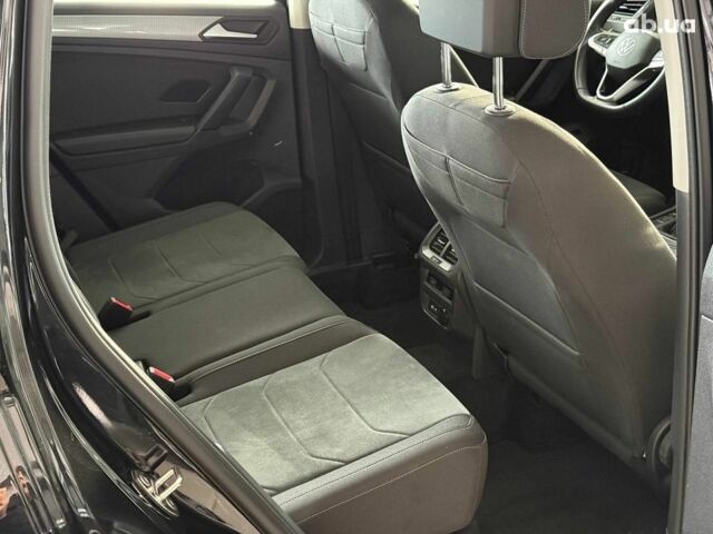 Чорний Фольксваген Тігуан, об'ємом двигуна 2 л та пробігом 56 тис. км за 33990 $, фото 18 на Automoto.ua