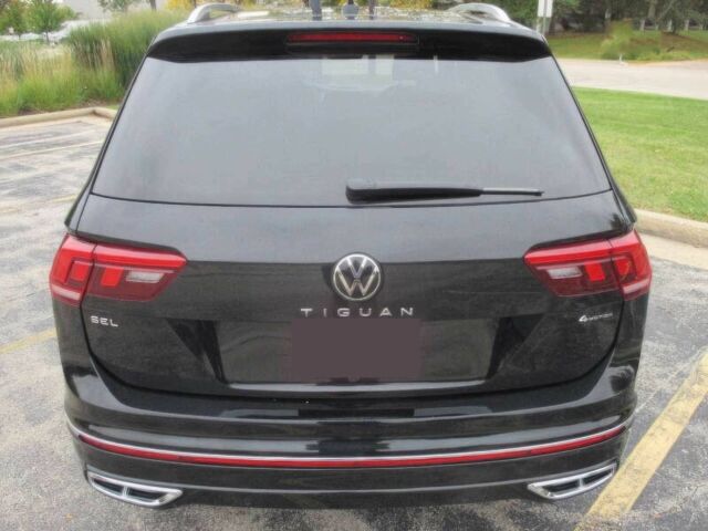 Черный Фольксваген Тигуан, объемом двигателя 2 л и пробегом 13 тыс. км за 8900 $, фото 4 на Automoto.ua