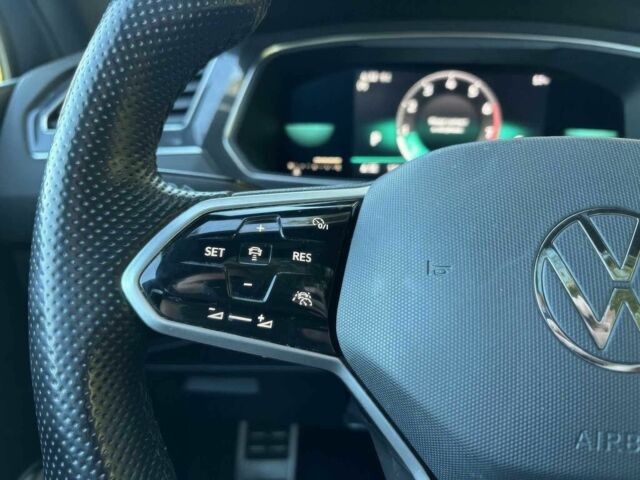 Чорний Фольксваген Тігуан, об'ємом двигуна 2 л та пробігом 27 тис. км за 9000 $, фото 9 на Automoto.ua