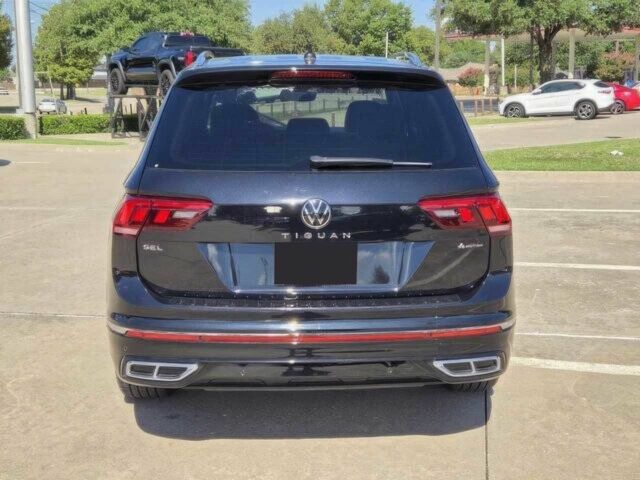 Чорний Фольксваген Тігуан, об'ємом двигуна 2 л та пробігом 15 тис. км за 8900 $, фото 6 на Automoto.ua