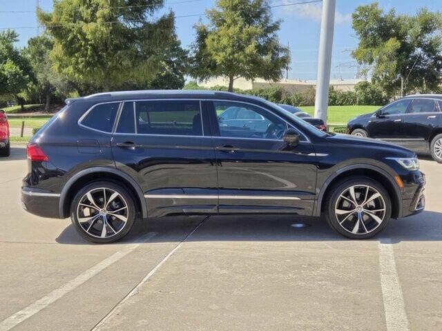 Чорний Фольксваген Тігуан, об'ємом двигуна 2 л та пробігом 15 тис. км за 8900 $, фото 4 на Automoto.ua