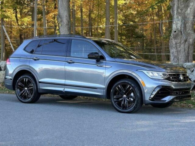 Чорний Фольксваген Тігуан, об'ємом двигуна 2 л та пробігом 27 тис. км за 9000 $, фото 2 на Automoto.ua