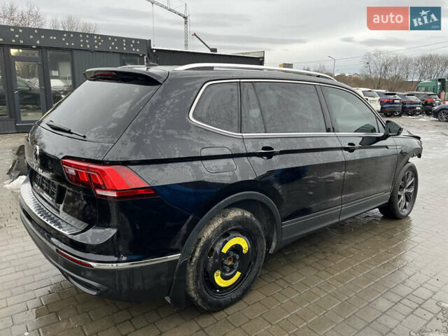 Черный Фольксваген Тигуан, объемом двигателя 2 л и пробегом 140 тыс. км за 18700 $, фото 2 на Automoto.ua