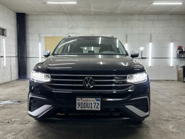 Черный Фольксваген Тигуан, объемом двигателя 2 л и пробегом 115 тыс. км за 21499 $, фото 2 на Automoto.ua