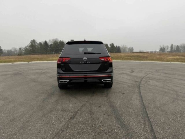 Чорний Фольксваген Тігуан, об'ємом двигуна 2 л та пробігом 29 тис. км за 13000 $, фото 4 на Automoto.ua
