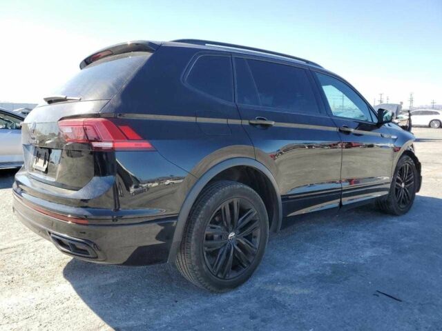 Черный Фольксваген Тигуан, объемом двигателя 2 л и пробегом 127 тыс. км за 19000 $, фото 2 на Automoto.ua