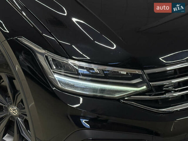 Чорний Фольксваген Тігуан, об'ємом двигуна 2 л та пробігом 98 тис. км за 25999 $, фото 7 на Automoto.ua