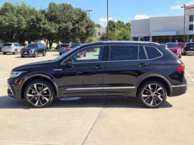 Чорний Фольксваген Тігуан, об'ємом двигуна 2 л та пробігом 15 тис. км за 8900 $, фото 3 на Automoto.ua