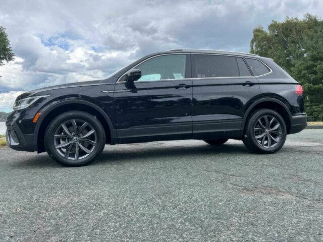 Черный Фольксваген Тигуан, объемом двигателя 2 л и пробегом 12 тыс. км за 13000 $, фото 5 на Automoto.ua