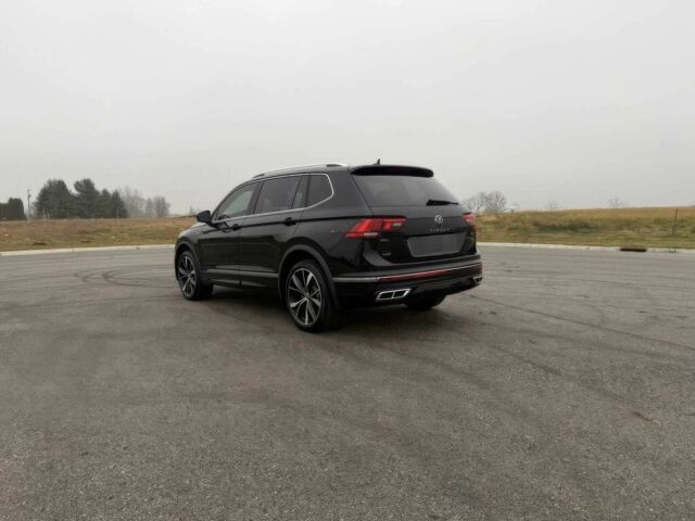 Чорний Фольксваген Тігуан, об'ємом двигуна 2 л та пробігом 29 тис. км за 13000 $, фото 5 на Automoto.ua