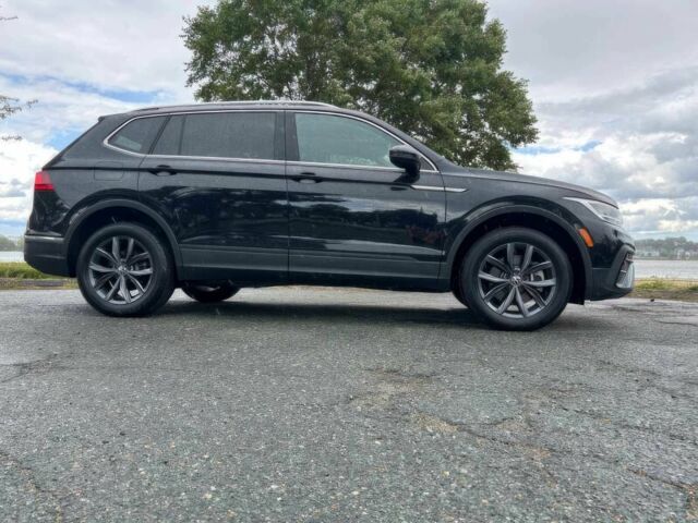 Черный Фольксваген Тигуан, объемом двигателя 2 л и пробегом 12 тыс. км за 13000 $, фото 6 на Automoto.ua