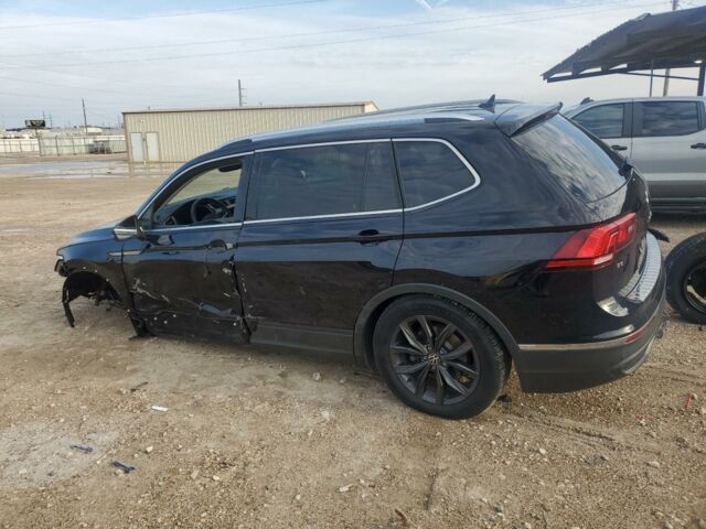 Чорний Фольксваген Тігуан, об'ємом двигуна 2 л та пробігом 63 тис. км за 15500 $, фото 3 на Automoto.ua