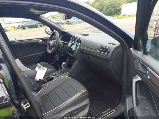 Черный Фольксваген Тигуан, объемом двигателя 2 л и пробегом 38 тыс. км за 8600 $, фото 4 на Automoto.ua