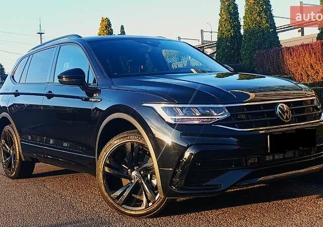 Черный Фольксваген Тигуан, объемом двигателя 2 л и пробегом 89 тыс. км за 26900 $, фото 1 на Automoto.ua