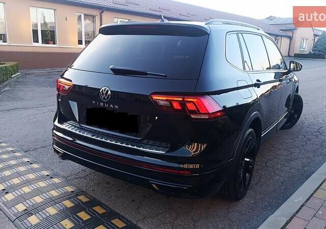 Черный Фольксваген Тигуан, объемом двигателя 2 л и пробегом 89 тыс. км за 26900 $, фото 57 на Automoto.ua