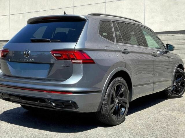 Черный Фольксваген Тигуан, объемом двигателя 2 л и пробегом 11 тыс. км за 7800 $, фото 2 на Automoto.ua