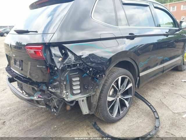 Черный Фольксваген Тигуан, объемом двигателя 2 л и пробегом 38 тыс. км за 8600 $, фото 5 на Automoto.ua