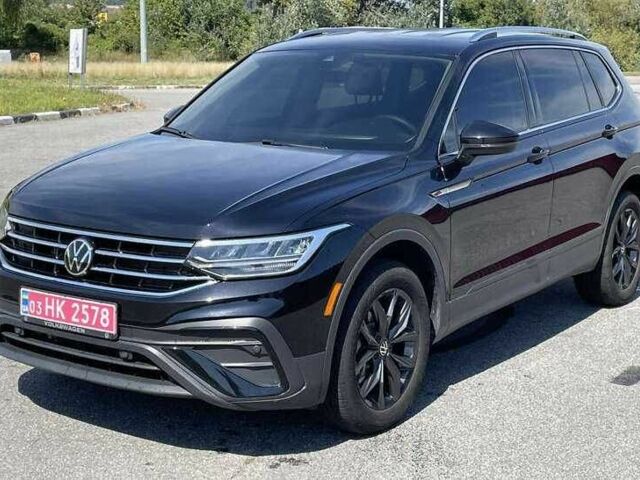 Чорний Фольксваген Тігуан, об'ємом двигуна 2 л та пробігом 54 тис. км за 21000 $, фото 1 на Automoto.ua