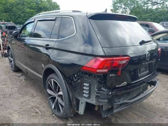 Черный Фольксваген Тигуан, объемом двигателя 2 л и пробегом 38 тыс. км за 8600 $, фото 2 на Automoto.ua