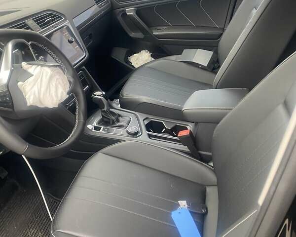 Чорний Фольксваген Тігуан, об'ємом двигуна 1.98 л та пробігом 3 тис. км за 14000 $, фото 7 на Automoto.ua