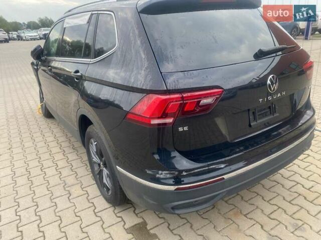 Чорний Фольксваген Тігуан, об'ємом двигуна 1.98 л та пробігом 3 тис. км за 14000 $, фото 2 на Automoto.ua