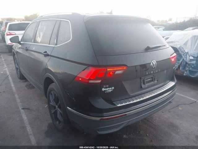 Чорний Фольксваген Тігуан, об'ємом двигуна 2 л та пробігом 16 тис. км за 8000 $, фото 2 на Automoto.ua