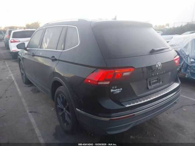 Чорний Фольксваген Тігуан, об'ємом двигуна 2 л та пробігом 16 тис. км за 8000 $, фото 13 на Automoto.ua