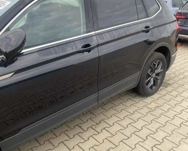 Чорний Фольксваген Тігуан, об'ємом двигуна 1.98 л та пробігом 3 тис. км за 14000 $, фото 3 на Automoto.ua