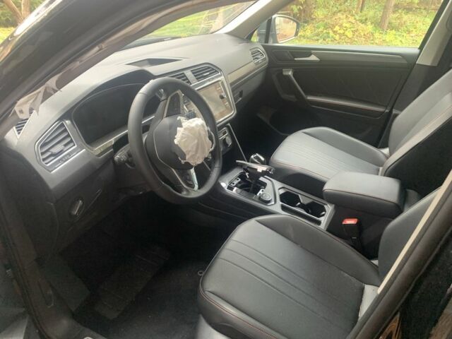 Чорний Фольксваген Тігуан, об'ємом двигуна 2 л та пробігом 14 тис. км за 12900 $, фото 3 на Automoto.ua