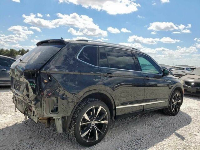 Черный Фольксваген Тигуан, объемом двигателя 2 л и пробегом 15 тыс. км за 9900 $, фото 4 на Automoto.ua