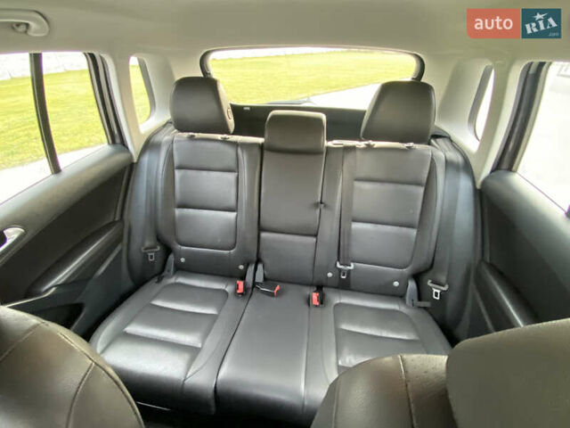 Фіолетовий Фольксваген Тігуан, об'ємом двигуна 1.98 л та пробігом 233 тис. км за 11800 $, фото 25 на Automoto.ua