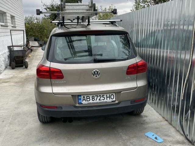 Коричневый Фольксваген Тигуан, объемом двигателя 1.98 л и пробегом 143 тыс. км за 13500 $, фото 2 на Automoto.ua