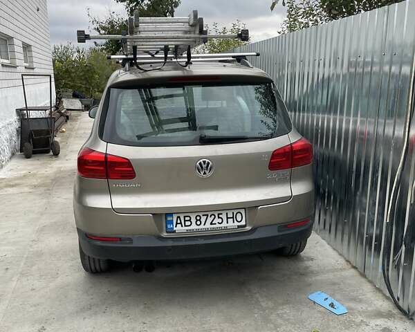 Коричневый Фольксваген Тигуан, объемом двигателя 1.98 л и пробегом 143 тыс. км за 13500 $, фото 2 на Automoto.ua