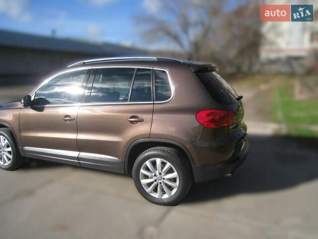 Коричневий Фольксваген Тігуан, об'ємом двигуна 2 л та пробігом 96 тис. км за 16700 $, фото 2 на Automoto.ua