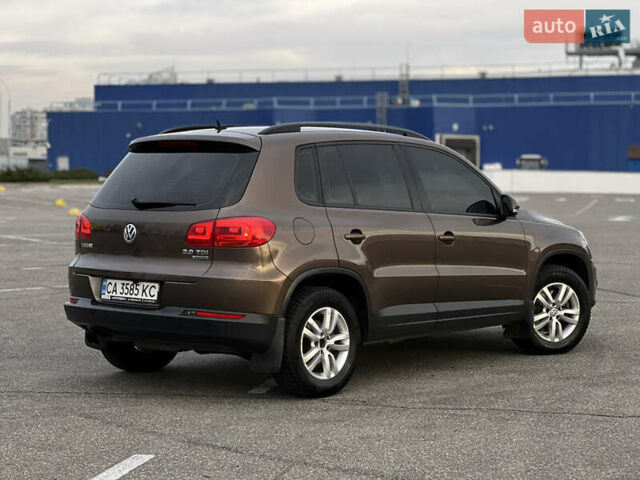 Коричневый Фольксваген Тигуан, объемом двигателя 2 л и пробегом 251 тыс. км за 13500 $, фото 1 на Automoto.ua