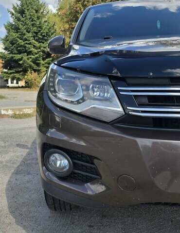 Коричневый Фольксваген Тигуан, объемом двигателя 1.97 л и пробегом 230 тыс. км за 13500 $, фото 4 на Automoto.ua