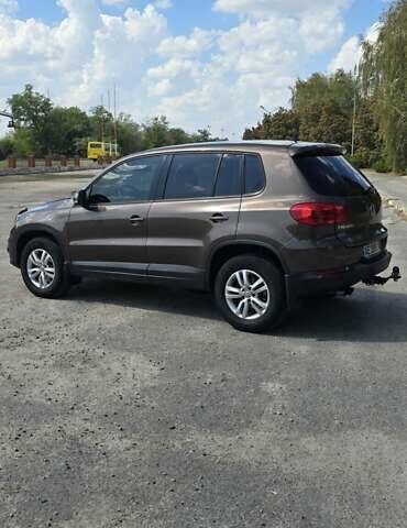 Коричневый Фольксваген Тигуан, объемом двигателя 1.97 л и пробегом 230 тыс. км за 13500 $, фото 3 на Automoto.ua