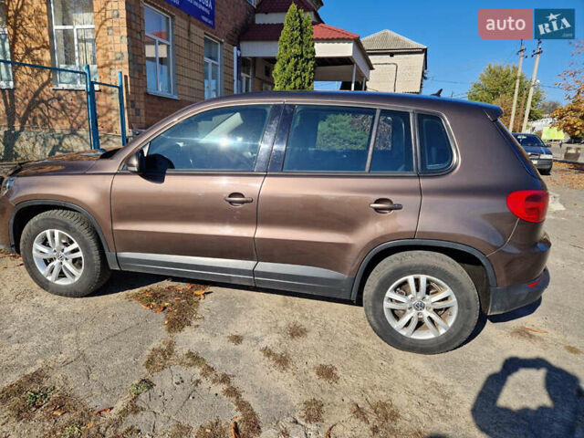 Коричневый Фольксваген Тигуан, объемом двигателя 1.97 л и пробегом 282 тыс. км за 12700 $, фото 2 на Automoto.ua