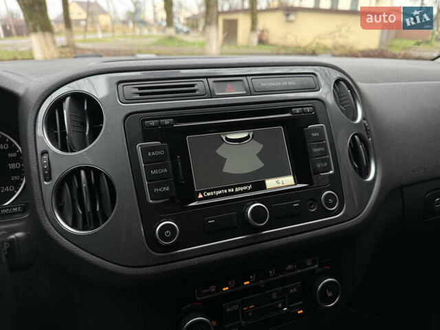 Коричневий Фольксваген Тігуан, об'ємом двигуна 2 л та пробігом 210 тис. км за 13900 $, фото 35 на Automoto.ua