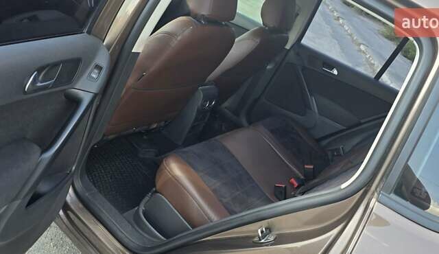 Коричневый Фольксваген Тигуан, объемом двигателя 1.97 л и пробегом 230 тыс. км за 13500 $, фото 11 на Automoto.ua