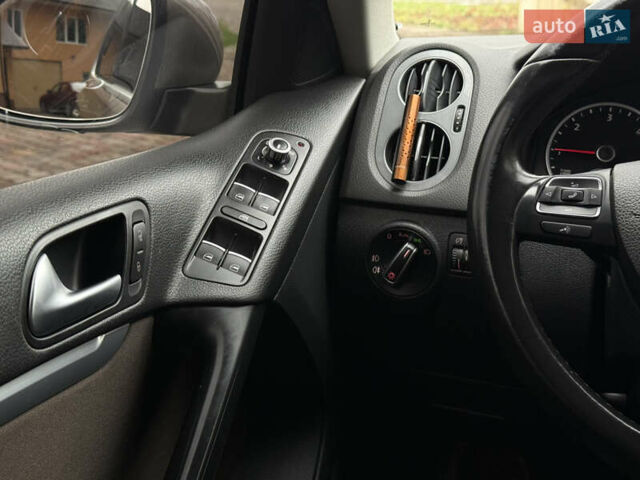 Коричневий Фольксваген Тігуан, об'ємом двигуна 2 л та пробігом 210 тис. км за 13900 $, фото 28 на Automoto.ua